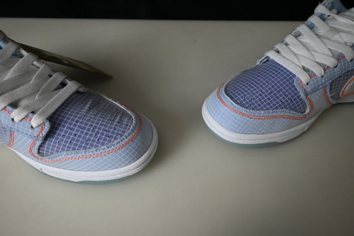 union x nike dunk low “passport pack argon” dj9649-400