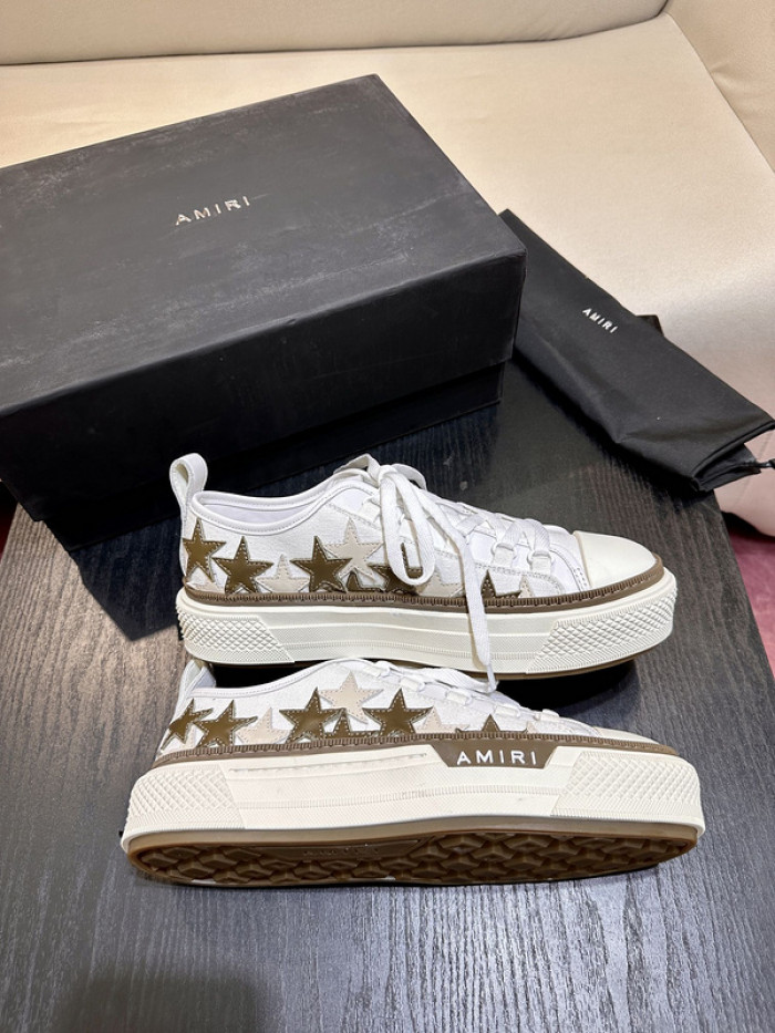 amiri* appliquéd leather and canvas sneakers