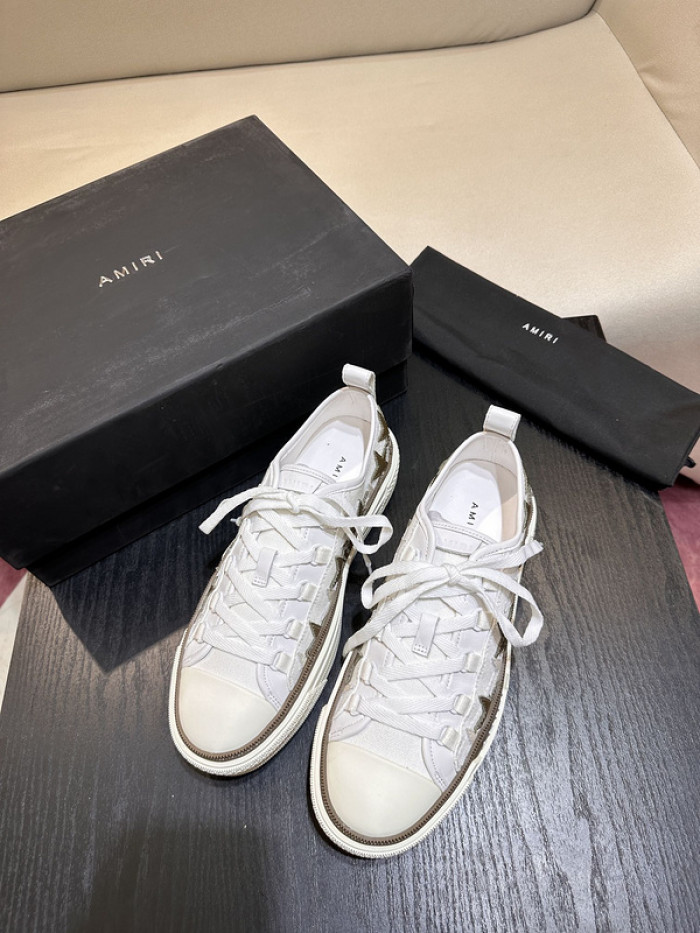 amiri* appliquéd leather and canvas sneakers