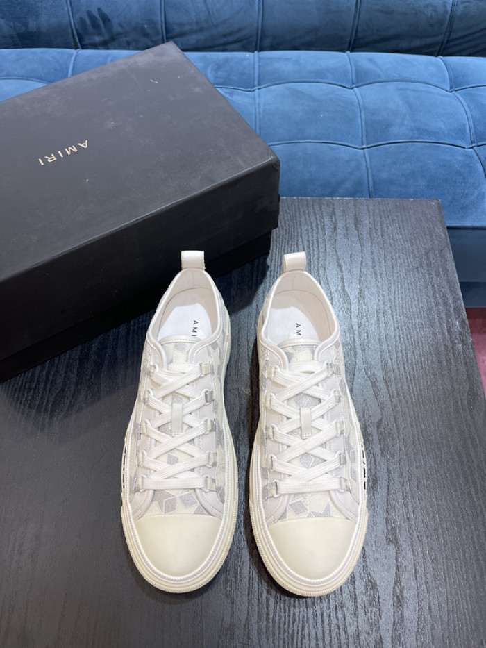 amiri* appliquéd leather and canvas sneakers